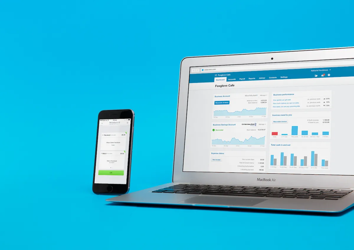 Cloud bookkeeping shown on a laptop and mobile devices